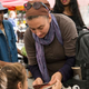 A woman and her daughter count out food stamps in September in New York City.
Andrew Burton/Getty Images